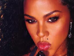 Book Lil` Kim